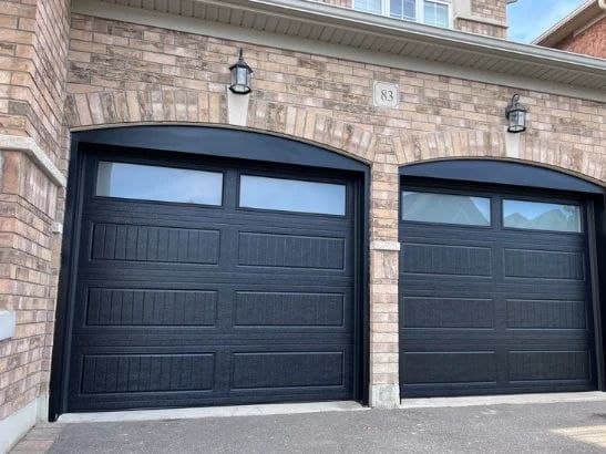Double black garage doors repaired in Marietta — Garage Door Max